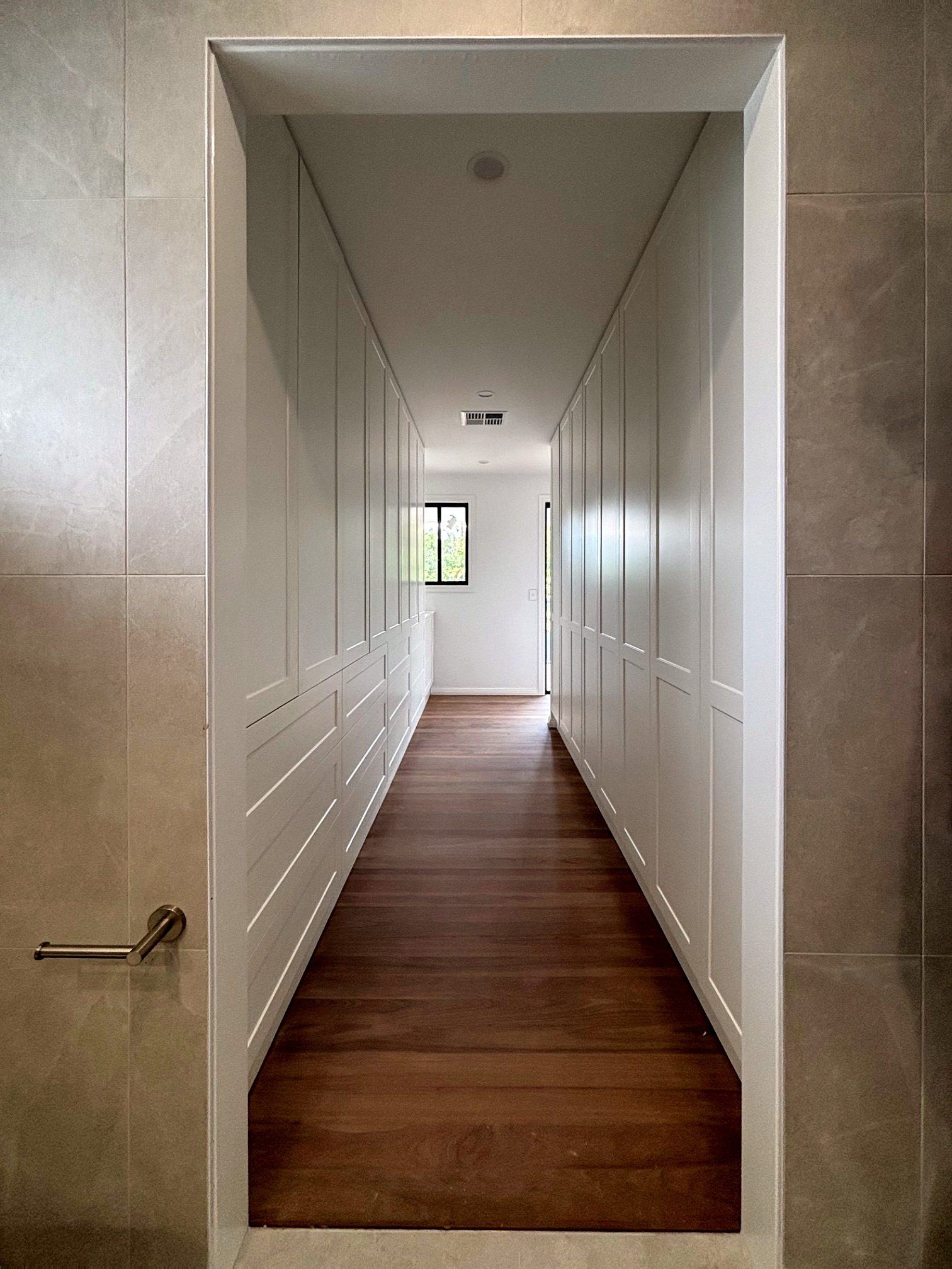 Through the walk-in robe to the deck