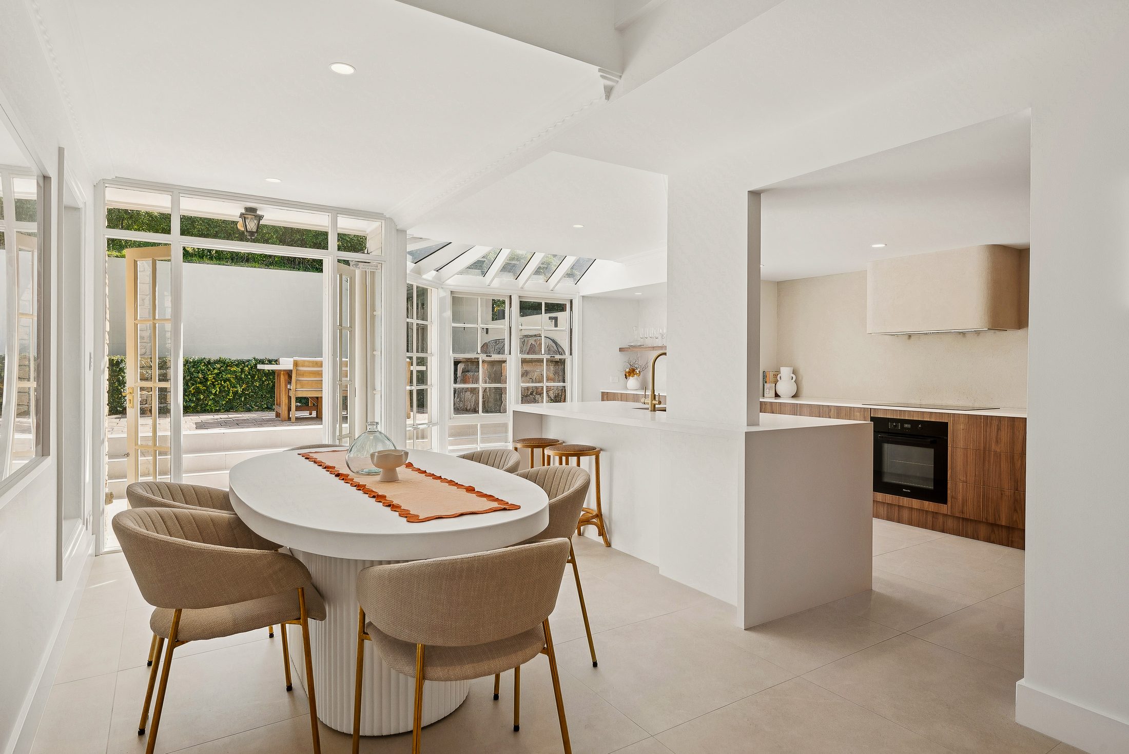 Dining, kitchen and sunroom